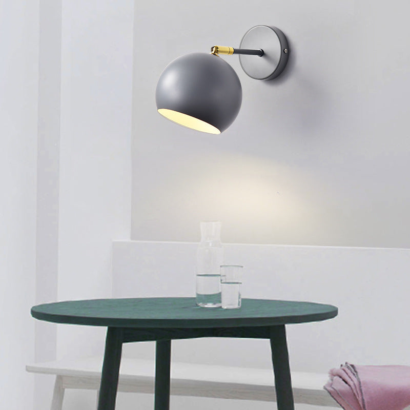 Adjustable Matte Metal Globe Wall Lamp with Brass Pivot Arm | High & Bury