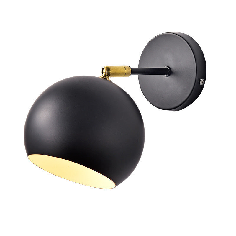 Adjustable Matte Metal Globe Wall Lamp with Brass Pivot Arm | High & Bury