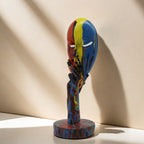 Artful Decoration in the Form of a Contemplative Figure | High & Bury