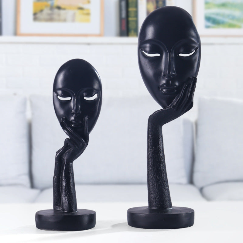 Artful Decoration in the Form of a Contemplative Figure | High & Bury
