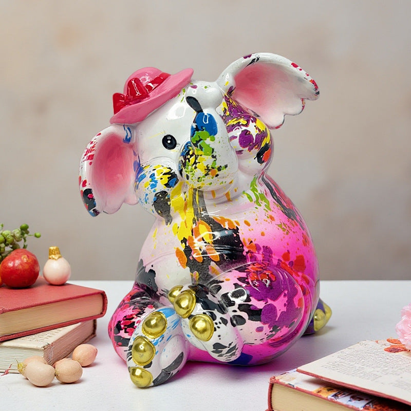 Artistic Elephant Figure with Football Motif | High & Bury