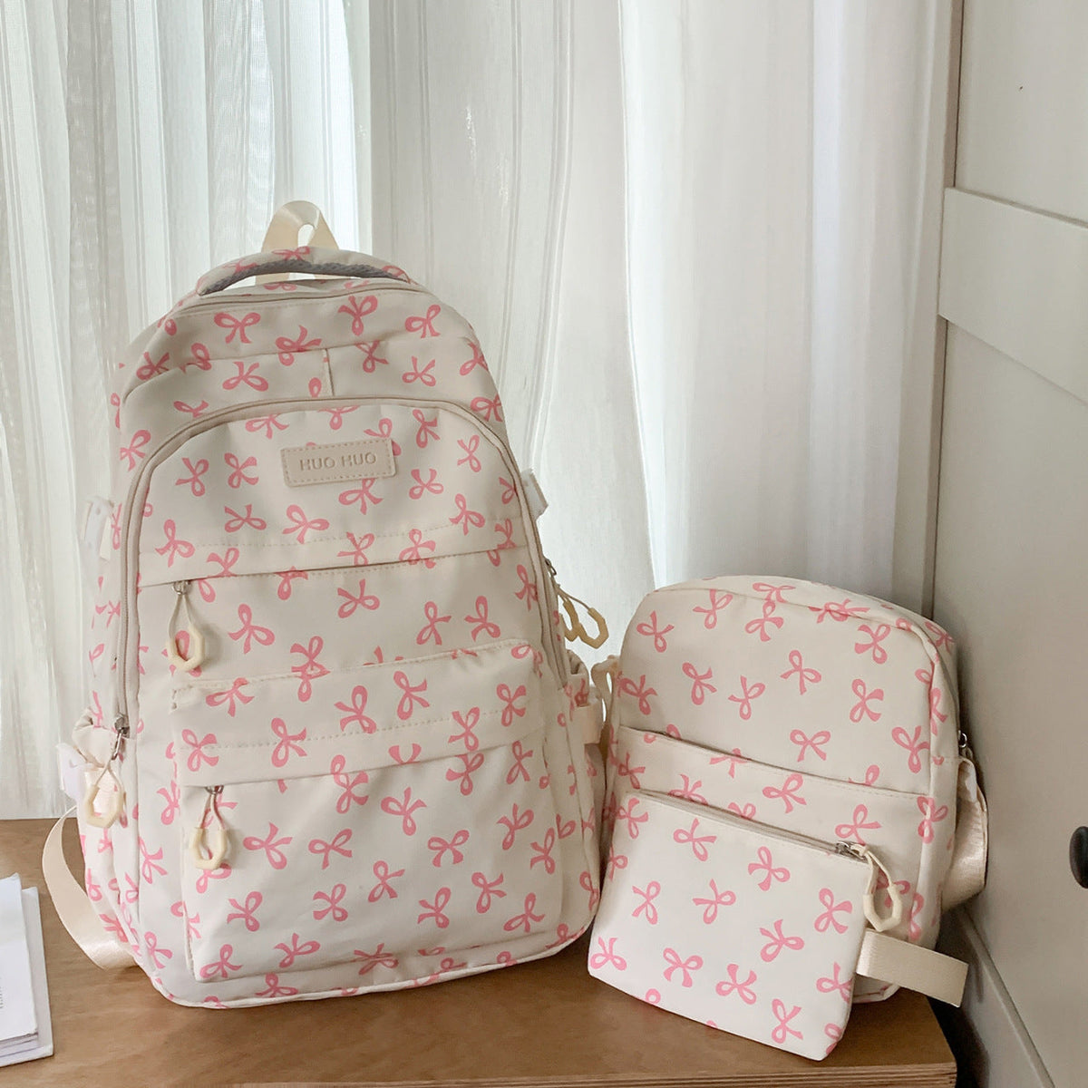 Bow Print Backpack with Padded Shoulder Straps and Multiple Pockets