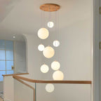 Cascading Glass Globe Pendant Lamp with Wooden Ceiling | High & Bury