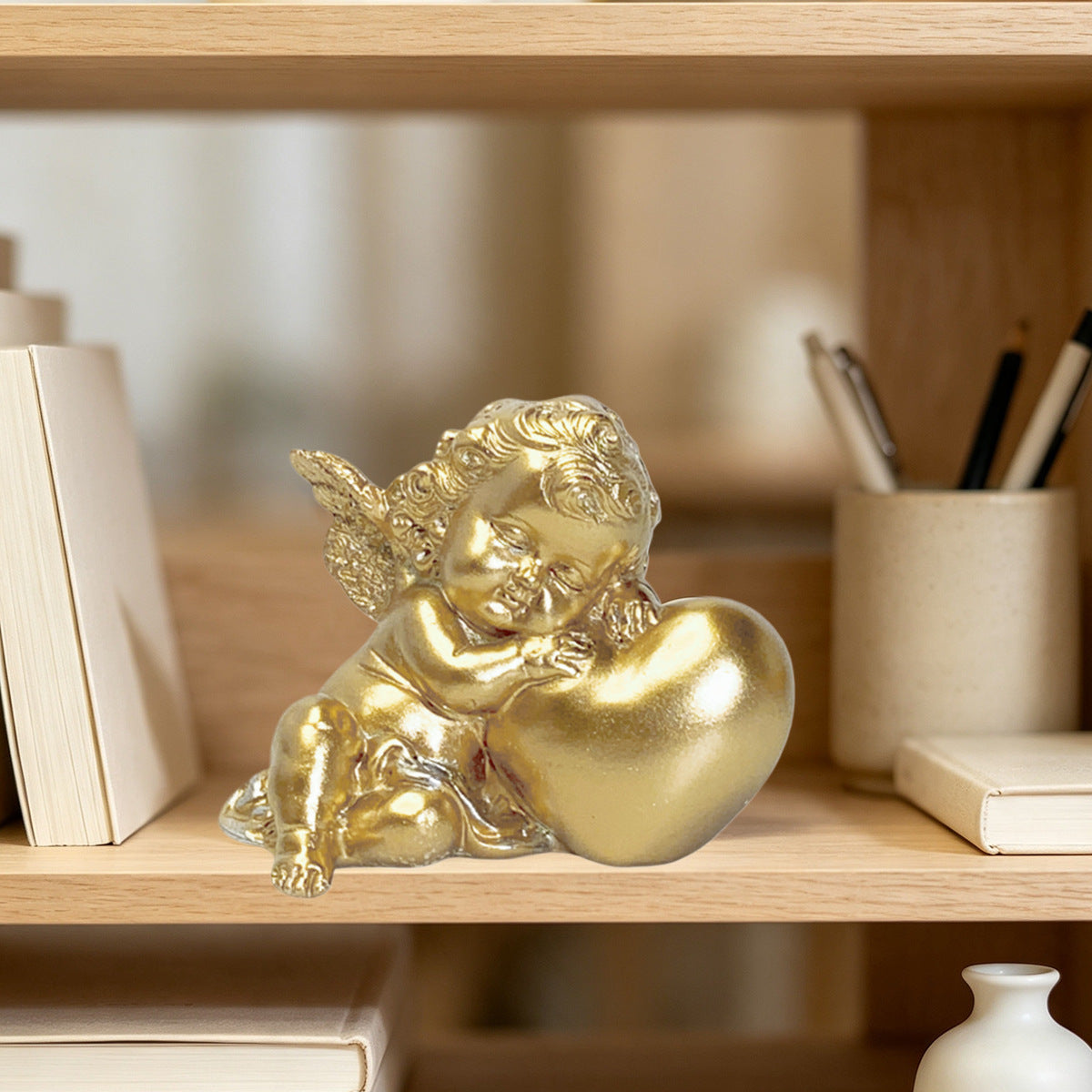 Charming Angel Figure with Heart Motif | High & Bury