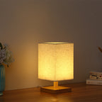 Compact Scandinavian Wooden Foot Table Lamp with Linen Lampshade | High & Bury