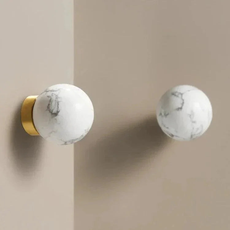 Dorrynta Brass Marble Knobs