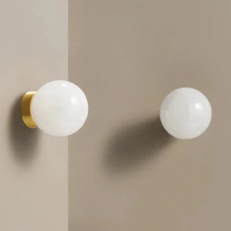 Dorrynta Brass Marble Knobs