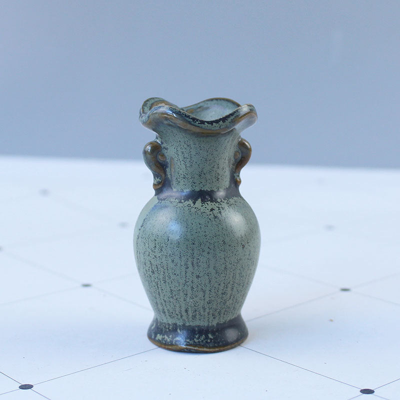 Elegant Ceramic Vase with Artistic Design | High & Bury