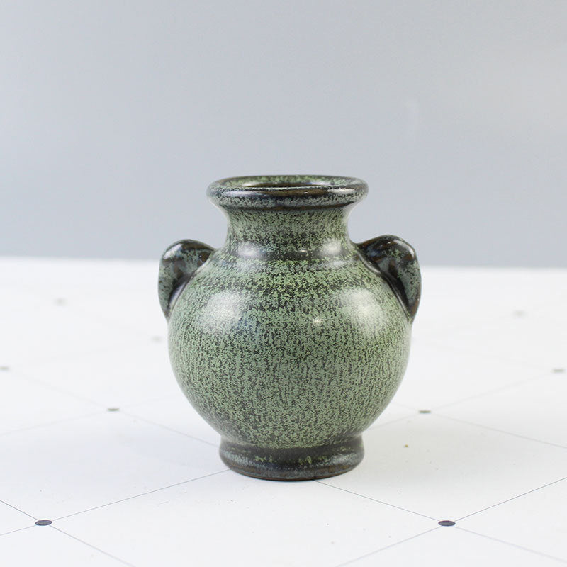 Elegant Ceramic Vase with Artistic Design | High & Bury