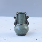 Elegant Ceramic Vase with Artistic Design | High & Bury