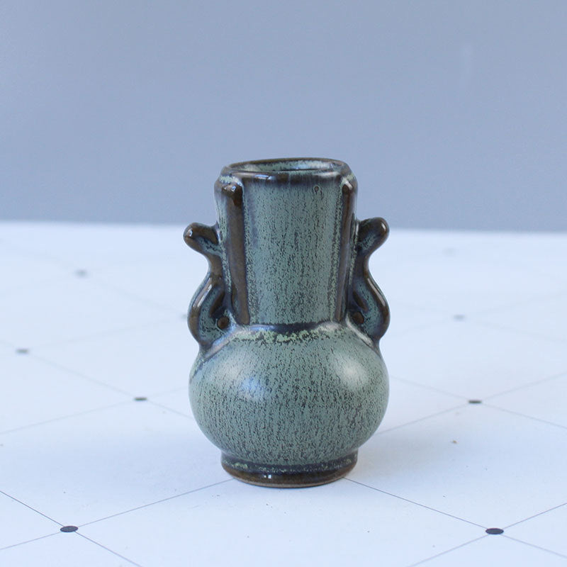 Elegant Ceramic Vase with Artistic Design | High & Bury