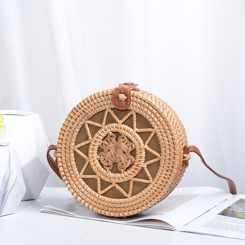 Elegant Round Handbag made of Woven Rattan | High & Bury