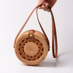 Elegant Round Handbag made of Woven Rattan | High & Bury