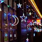 Festive LED Curtain String Lights with Hanging Star-Bell Tree and Reindeer Ornaments | High & Bury