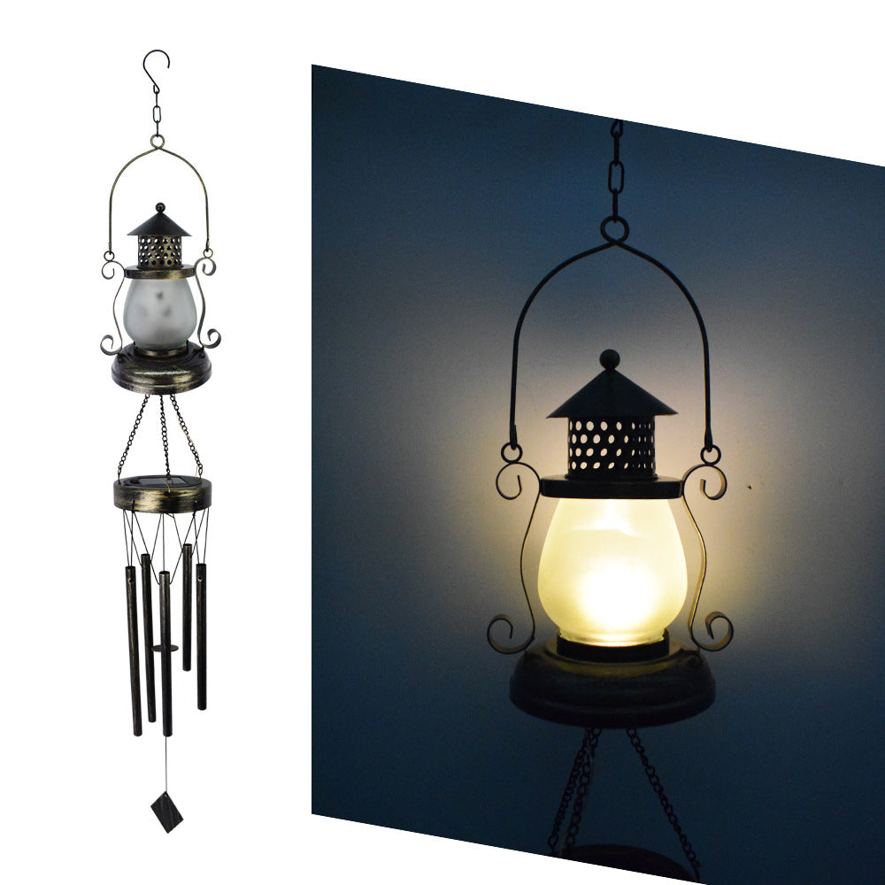 Hanging Flamingo Solar LED Wind Chime with Crackle Glass Globe | High & Bury