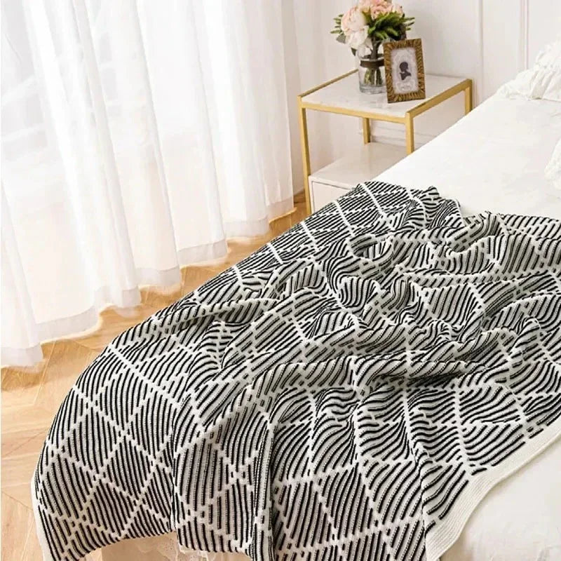 Kerdola Throw Blanket