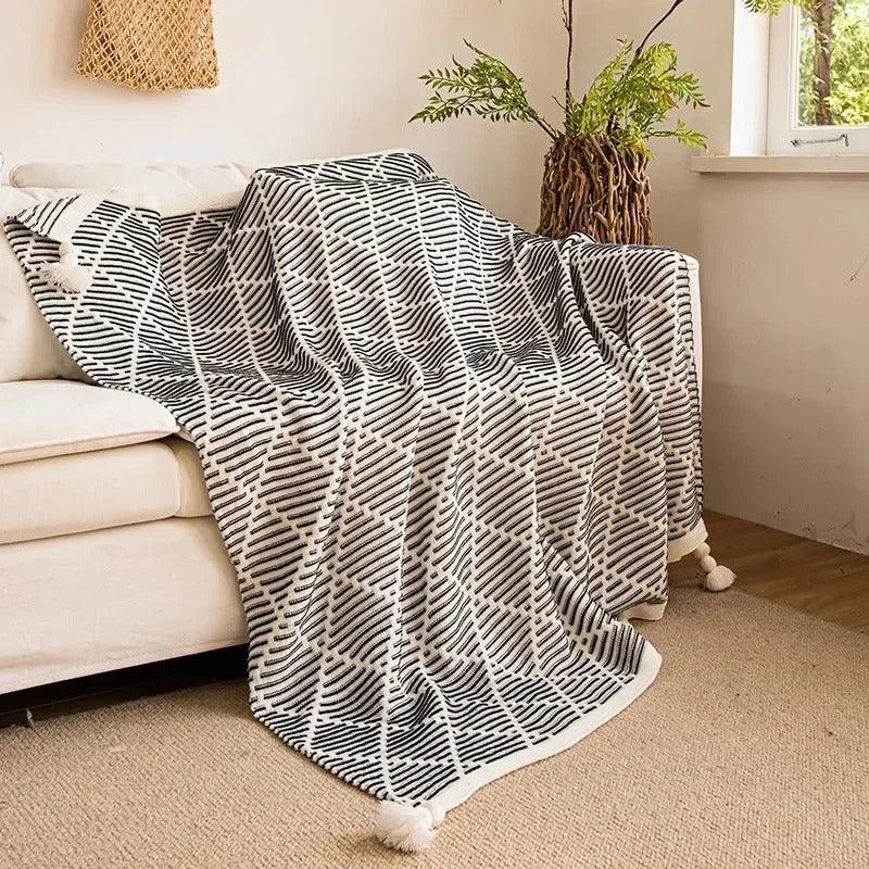 Kerdola Throw Blanket