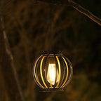 Outdoor Solar Hanging Lights in Metal Cage with Warm LED Candle Light | High & Bury