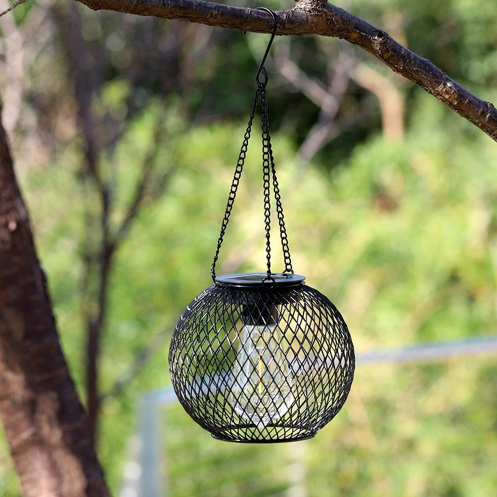 Outdoor Solar Hanging Lights in Metal Cage with Warm LED Candle Light | High & Bury