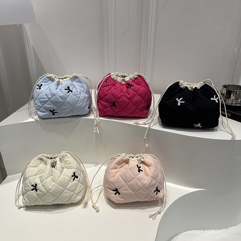 Quilted Drawstring Pouch with Bow Detail for Makeup and Everyday Essentials, view 2