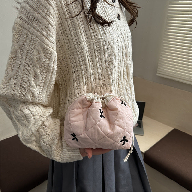 Quilted Drawstring Pouch with Bow Detail for Makeup and Everyday Essentials, view 4