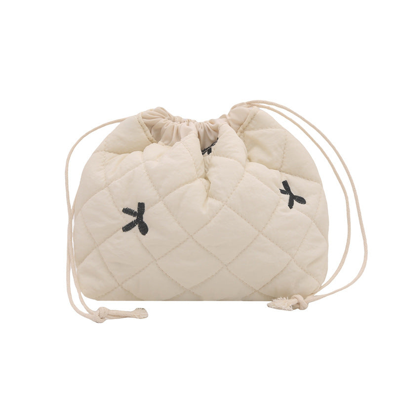 Quilted Drawstring Pouch with Bow Detail for Makeup and Everyday Essentials, view 6