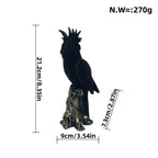 Shiny Parrot Figure on Log | High & Bury