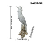 Shiny Parrot Figure on Log | High & Bury