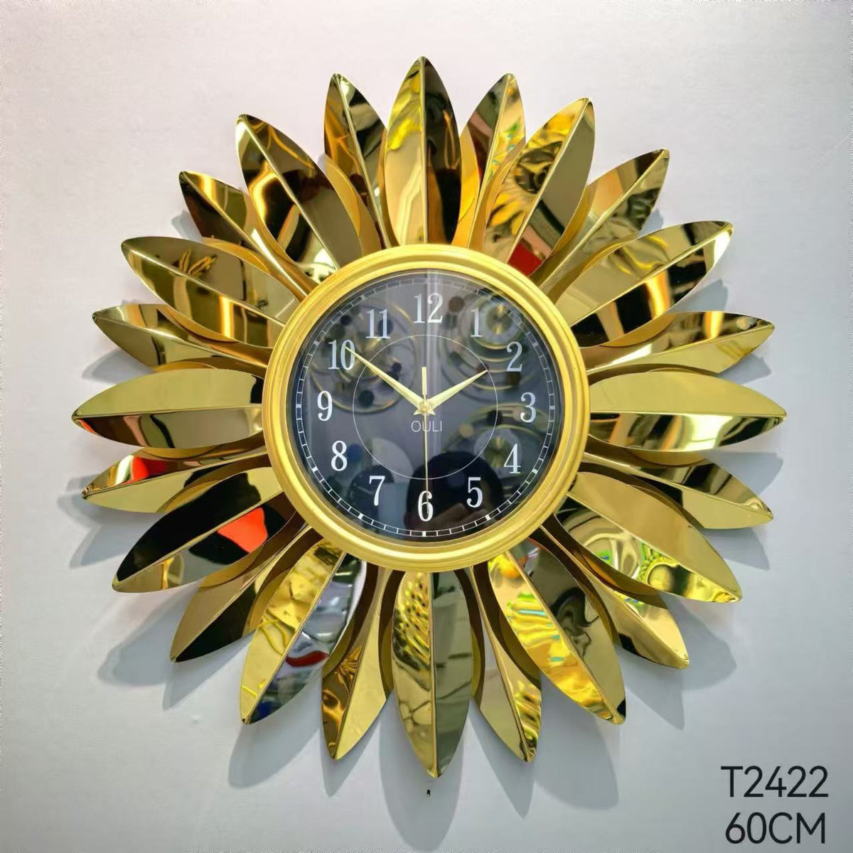Sunburst Decorative Wall Clock with Leaf Motif | High & Bury