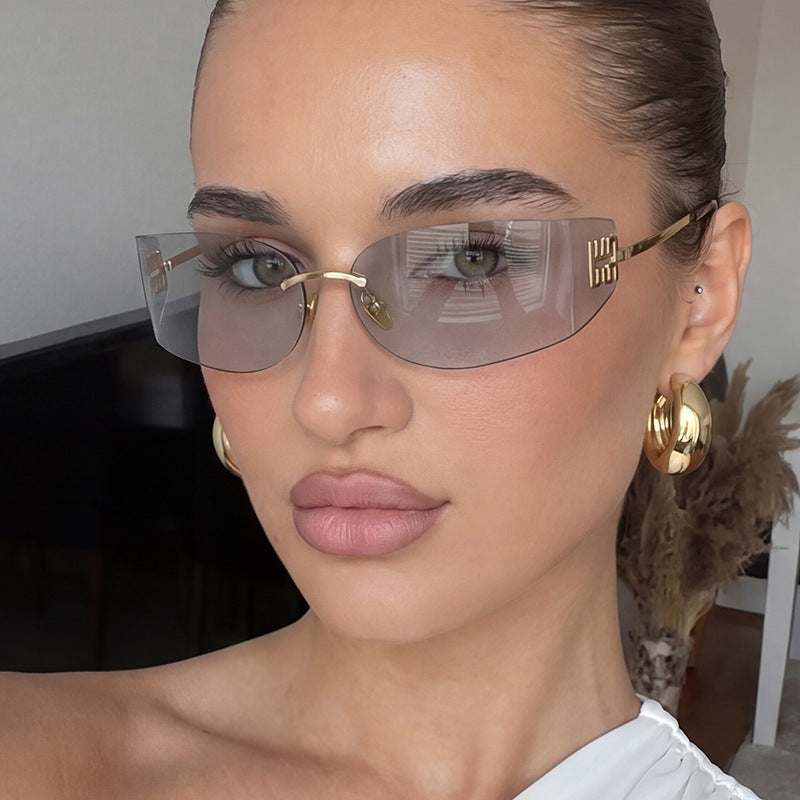 Women's Futuristic Sunglasses with Elaborate Frame and UV Protection